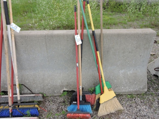 Assorted small brooms.