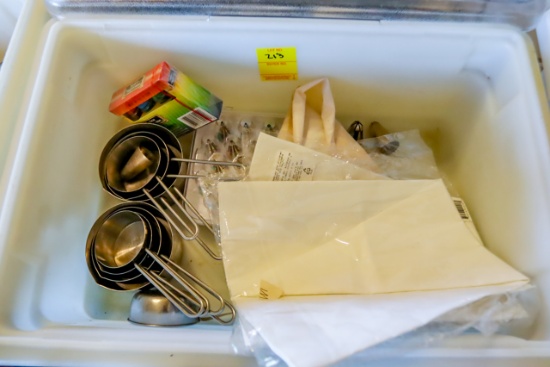 Tote of Cake Decorating Items, measuring cups & spoons, tips