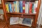 Basket of cookbooks / books on shelf / oracle yearbook / Ossian & Jefferson Twp. Book
