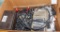 Box of Atari controls and items as well as other video controllers and material