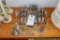 Stainless silverware in unique glass carrying tray