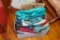 Box of make up, laundry, travel bags and totes