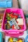 Fisher Price and other small toys in tote