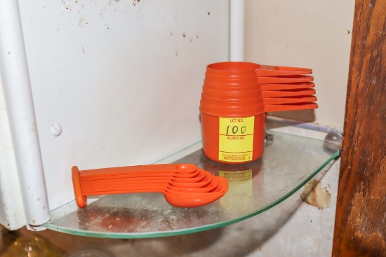 Tupperware Orange measuring cups and spoons