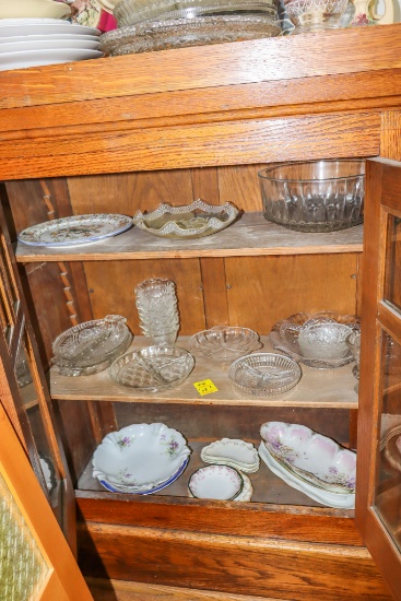Assorted glass in two built in cabinets