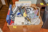 Large box of office supplies and electronics