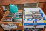 2 boxes of CDs (some empty CD cases)