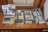 4 boxes of casettes and 2 DVDs