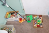 Box and flat of toys pencils and toy sword