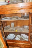Assorted glass in two built in cabinets
