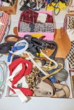 Box of belts and flannel sleep pants
