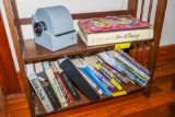Walt Disney and other books on bottom 2 shelves of book shelf, rolodex
