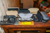 Assortment of eye glasses and cases