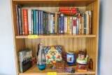 Books and décor on top 2 shelves