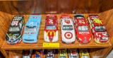 6 Nascar and racecars on shelf