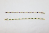 2 Ladies gold, ruby, emerald and diamond bracelets