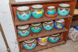 Southwest Style Planters on all 3 shelves