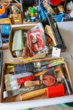 Flats with tools and shop items and small metal tool tray
