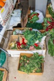 6 boxes of Christmas greenery and décor as well as tree stand