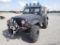 1998 JEEP WRANGLER, 2DSW, 2.5 L, L4 OHV 8V, BLACK SOFT TOP, BLACK ROCK RIMS