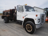 1980 IH MODEL 1724 TRUCK, V-8, GAS, 5/2 SPD. W/P-B HOT OIL PATCHER, SHOWS 2