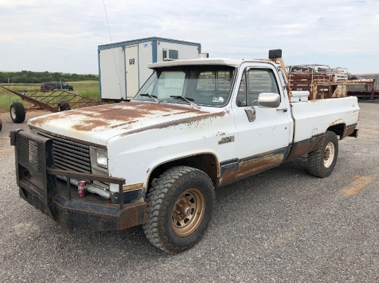 1983 GMC 2500 PICKUP, 4 SPD., 4X4, SINGLE CAB W/1,000 GAL. FUEL TANK & PUMP