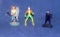 Hawk Man, Cat Woman And An X-man Action Figurine