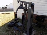 Lot 14: In Home/Garage Workout Machine  Missing Leg Extension  Butterfly, Leg Extension And Chest Pr