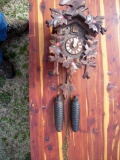 Lot 24: Antique Cuckoo Clock With Pine Cone Weights