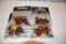 (4) Scale Models 1/64th Scale Versatile Tractors On Cards