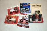 Assortment of Ertl 1/64th Scale Tractors On Card