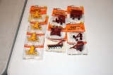 Assortment of 10  Ertl 1/64th Scale Implements On Card