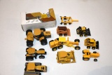 (11) Assortment Of 1/64th Scale Construction Equipment And CAT Tractors