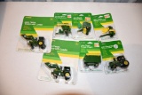 (7) Ertl John Deere Tractors And Implents, 1/64th Scale, All On Cards