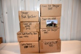 Assortment of 8 1/64th Scale Tractors With boxes