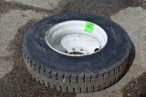 Firestone 11R22.5 Tire on a Steel Rim, 10 Bolt, Retread