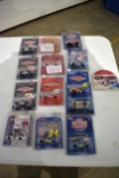 (13) Action 1/64th Scale Cars, (1) Team Caliber 1/64th Scale Car On Card