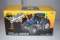 Ertl 1997 Toy Farmer, New Holland 8260, 1/16 Scale, With Box
