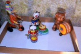 (3) Tin Wind Up Toys, And (1) Plastic Wind Up