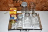 Assortment Of (6) Glass Fruit Jars With Assortment Of Lids