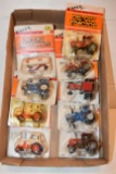 (9) 1/64th Scale Ertl Tractors On Cards, Some Have Been Opened, Case IH And Ford