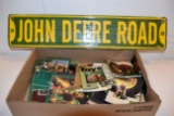 Large Assortment Of John Deere Toy Catalogs And John Deere Road Sign Reproduction