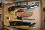 Assortment Of Knives And Compasses