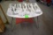 Table With Large Assortment Of Plastic Plant Signs
