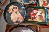 Two reproduction Coca-Cola serving trays