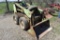 OMC Mustang Model 1000 Gas Skid Loader, Wisconsin Motor, Non Running, 7.5-15 Tires, 54'' Bucket, Ext