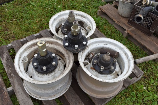 3 Rims And Hubs Off Of White Planter