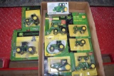 (8) John Deere Tractors On Card, 1 John Deere 1/64th Scale Tractor With Box