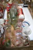 Assortment Of Coca Cola Glasses And Plastic Cups