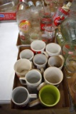 Assortment Of Coca Cola Coffee Cups And Glasses